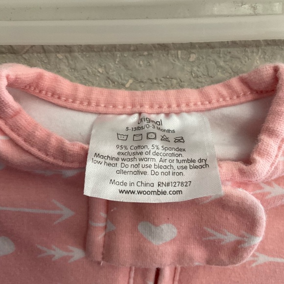 Woombie Pink Baby Swaddle with White Patterns - Picture 3 of 4